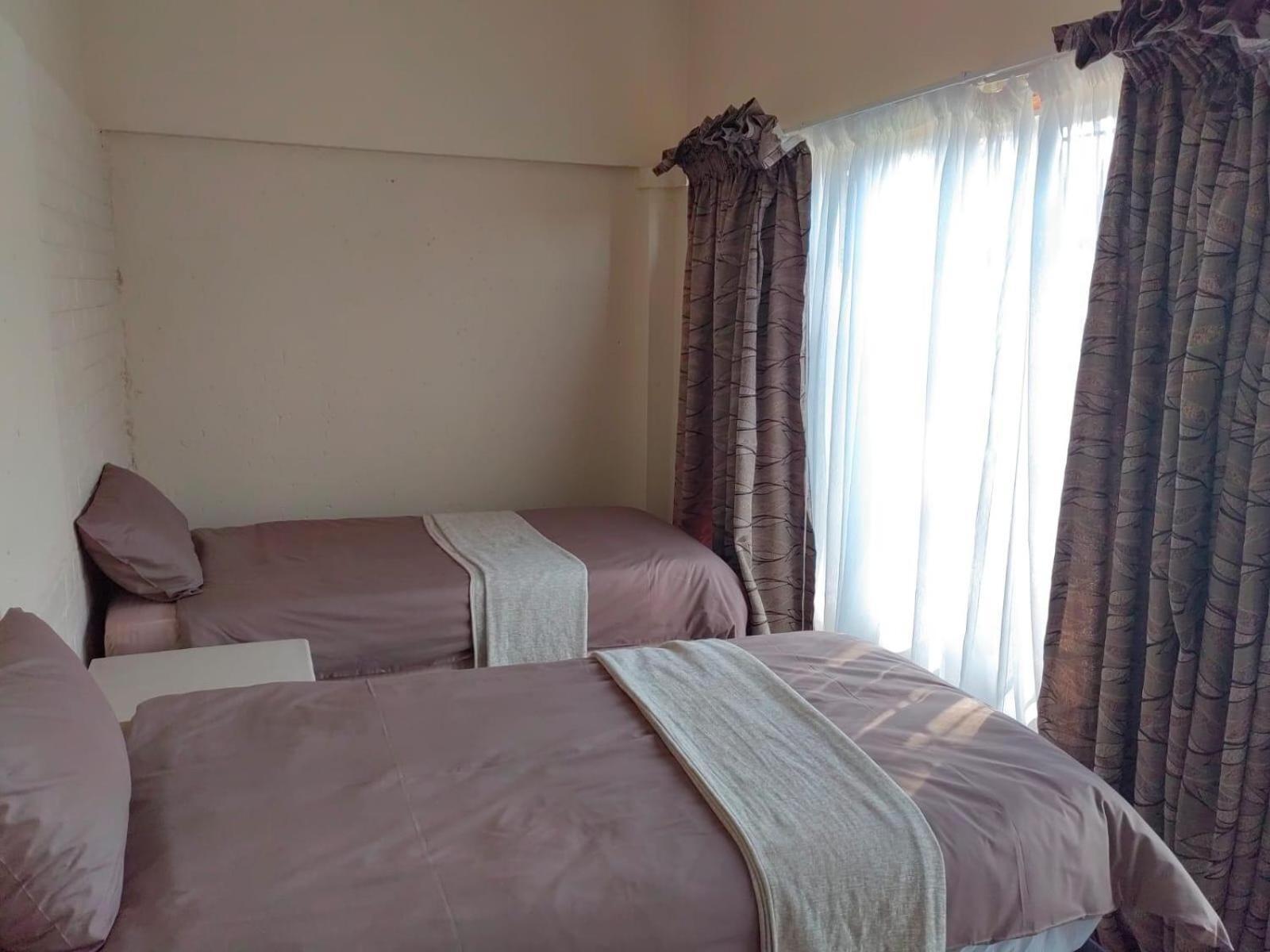 Sibahlenomhlambi Guesthouse Springs  Bilik gambar