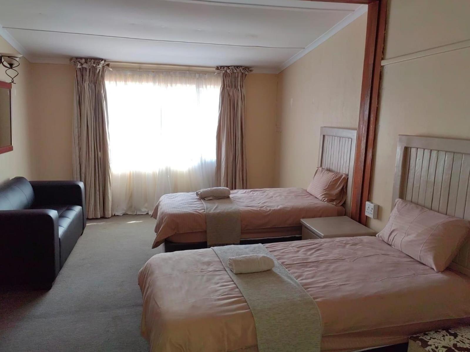 Sibahlenomhlambi Guesthouse Springs  Bilik gambar