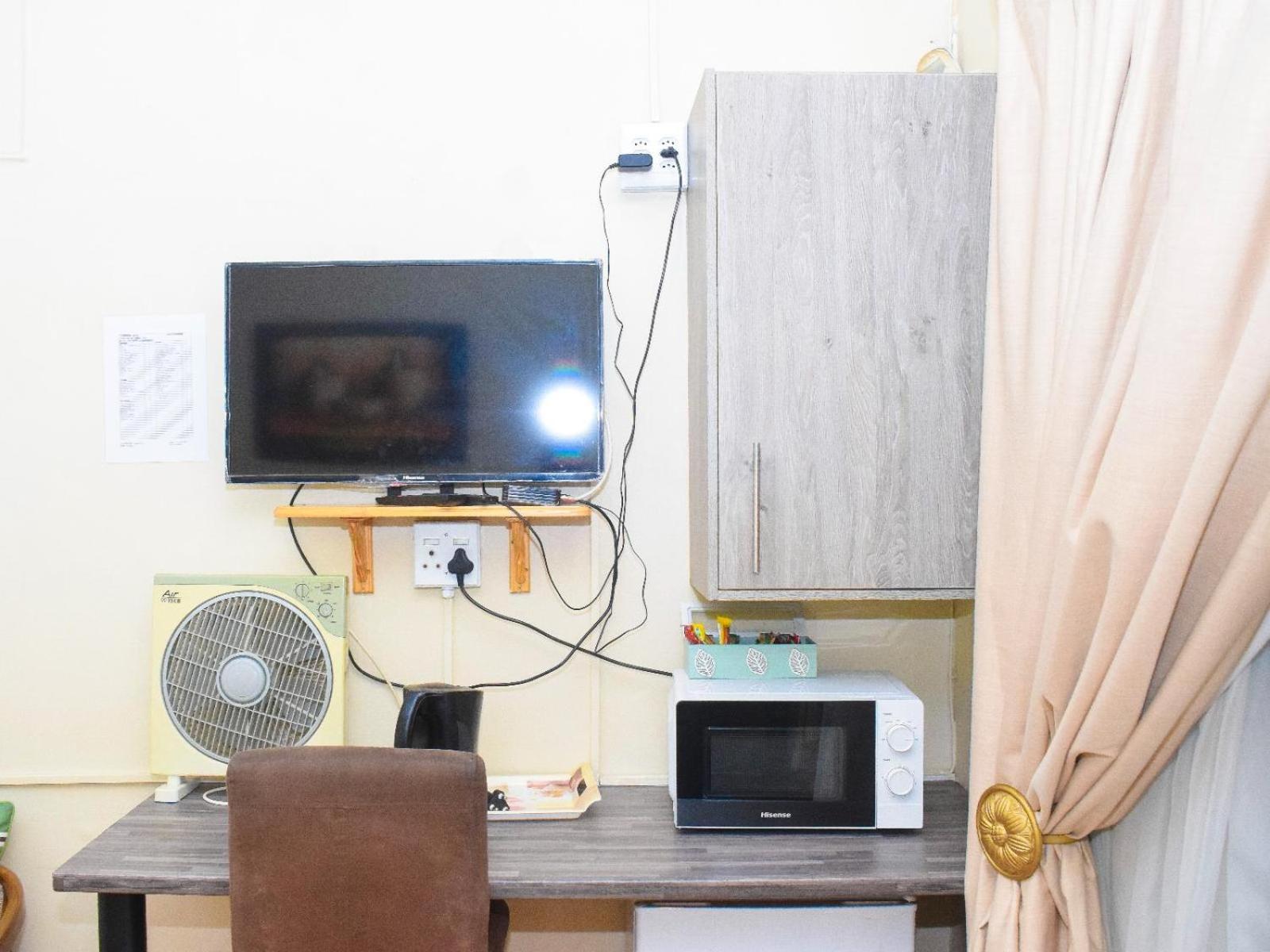 Sibahlenomhlambi Guesthouse Springs  Bilik gambar
