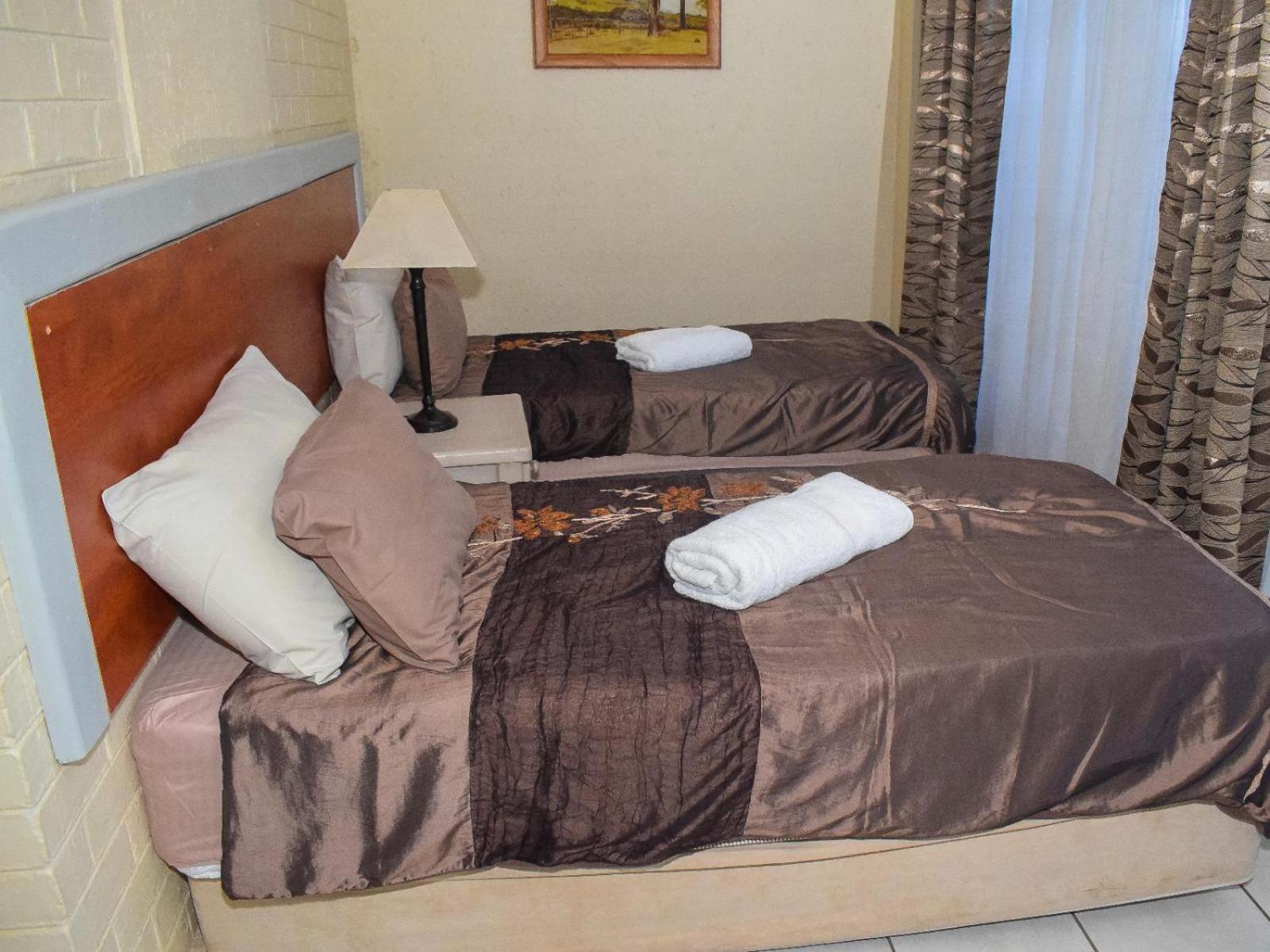 Sibahlenomhlambi Guesthouse Springs  Bilik gambar